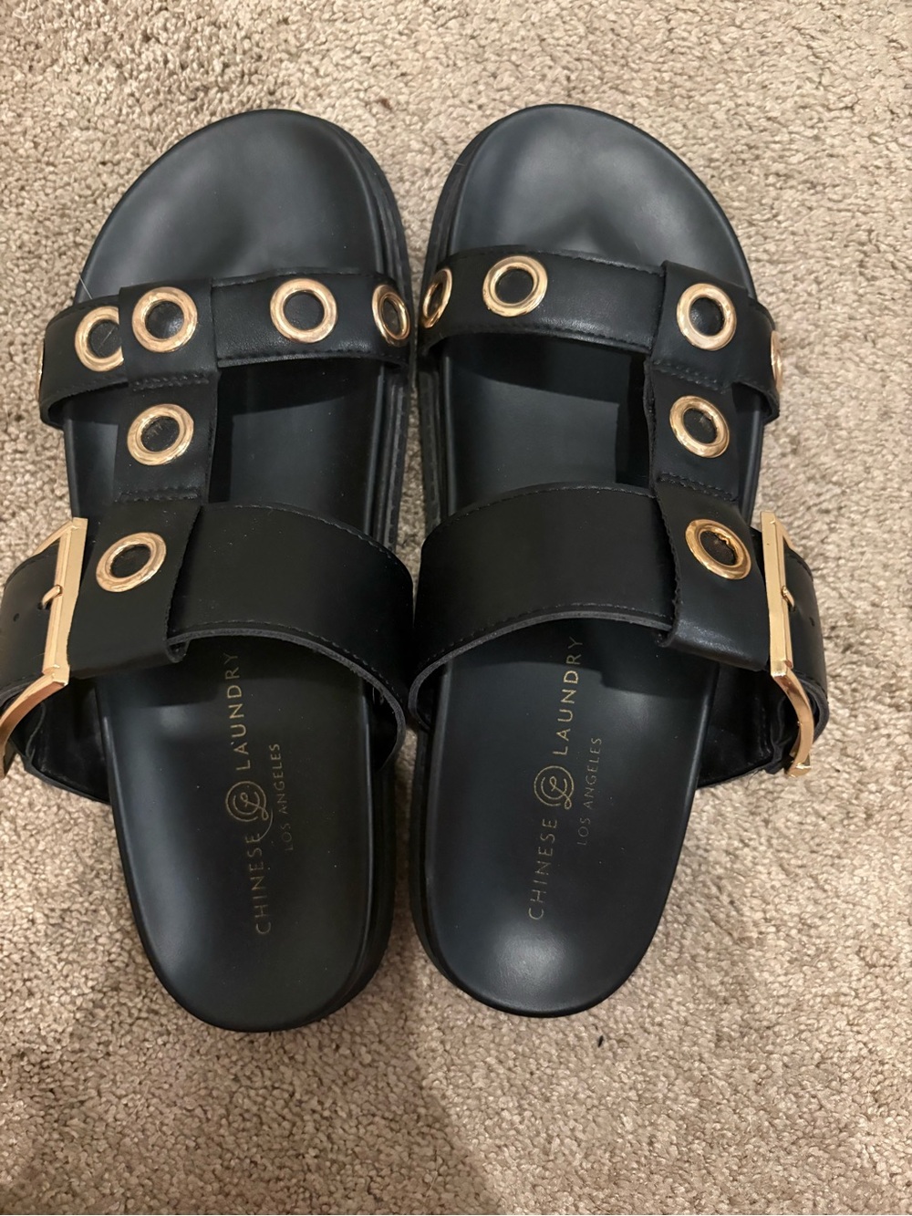 Black and gold slip in sandals used in excellent condition